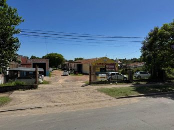 VENDO IMPORTANTE TERRENO CON GALPONES CALLE ALMAFUERTE