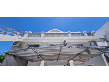 destacada VIVIENDA con frente al acceso al Tunel