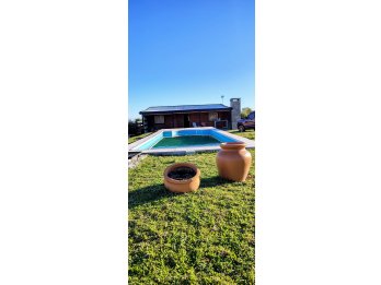 Vendo Cabaña con amplio terreno y piscina