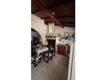 VENDO CASA CON LOCAL AL FRENTE Y DEPARTAMENTO AL FONDO