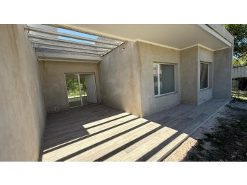 HERMOSA CASA A ESTRENAR EN ORO VERDE, 2 DORM Y FONDO VERDE.