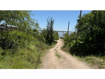 HERMOSO TERRENO DE 608 M2 A 3 MIN DEL RIO. ALDEA BRASILERA
