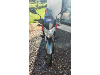 Bajar Rousser 125 ns... inmaculada
