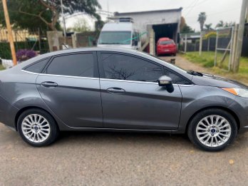 FORD FIESTA TITANIUM KD 1.6 POWERSHIFT 4P AÑO 2.014