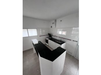 VENDE CASA A ESTRENAR CON PATIO Y COCHERA