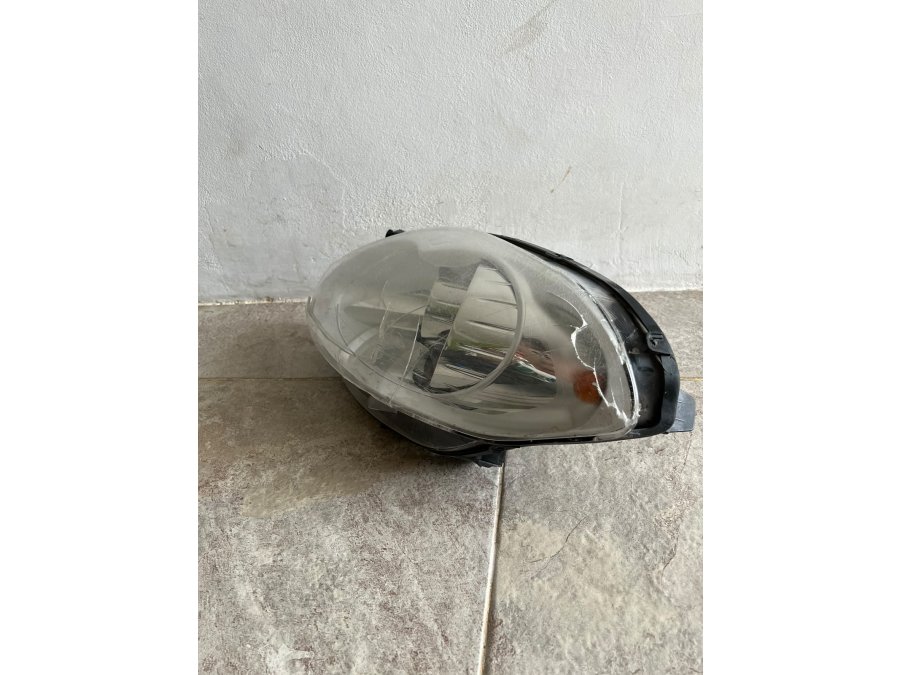 Óptica Izq. Fiat Palio