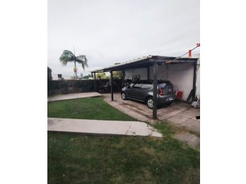 VENTA CASA DE 3 DORMITORIOS ZONA ESCUELA DE POLICIAS