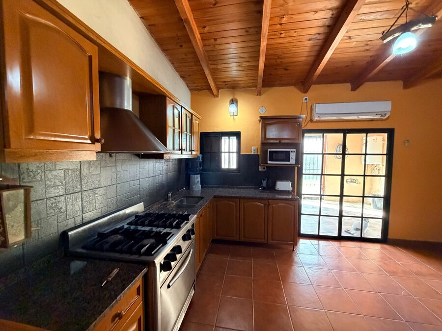 Casa + Local Comercial