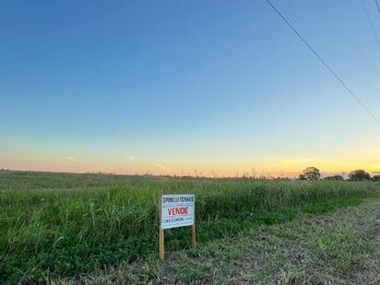 LOTE SOBRE ASFALTO EN COLINAS