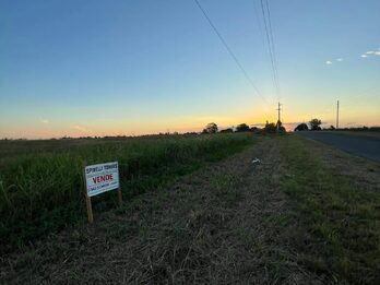 LOTE SOBRE ASFALTO EN COLINAS