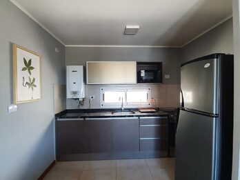 Alquilo departamento 2 dormitorios, cochera, zona Parque