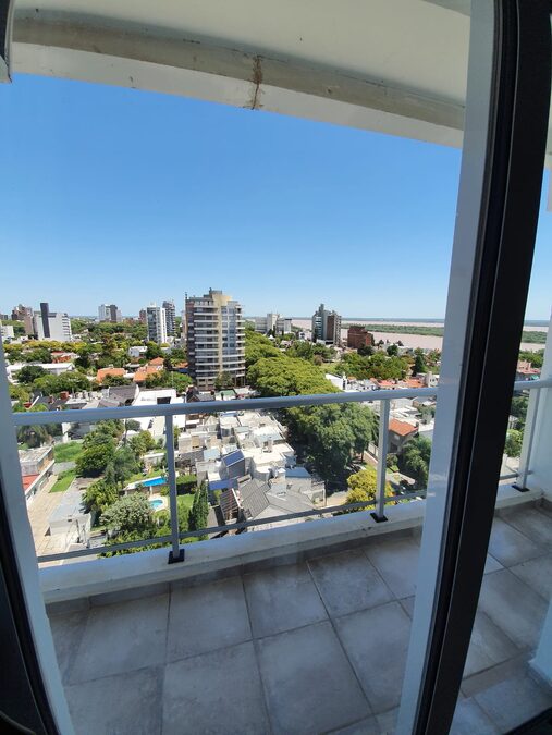 Alquilo departamento 2 dormitorios, cochera, zona Parque
