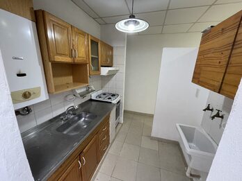 CASA CON PATIO Y COCHERA 2 DORMITORIOS ZONA GARRIGÓ Y LARRALDE