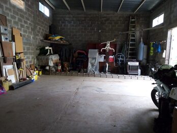 VENDO INPORTANTE PROPIEDAD CASA,CON DEPARTAMENTO,TERRENO GALPON,SALONES
