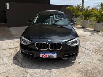 BMW  118I SPORT  5 P. AUT. Recibo vehículo de menor y mayor valor.