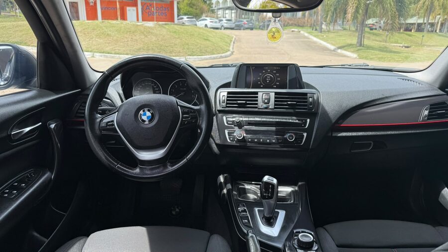 BMW  118I SPORT  5 P. AUT. Recibo vehículo de menor y mayor valor.