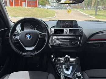 BMW  118I SPORT  5 P. AUT. Recibo vehículo de menor y mayor valor.