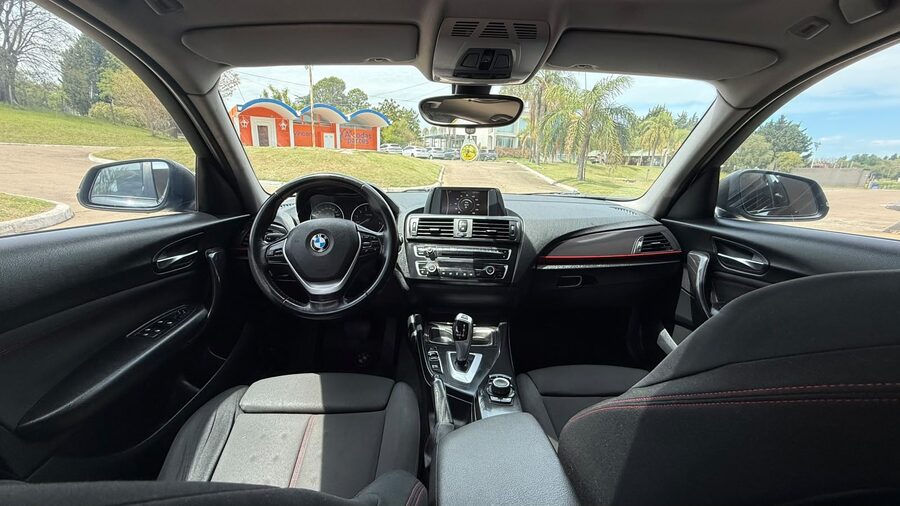 BMW  118I SPORT  5 P. AUT. Recibo vehículo de menor y mayor valor.