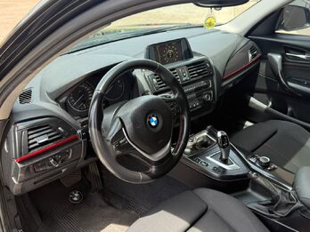 BMW  118I SPORT  5 P. AUT. Recibo vehículo de menor y mayor valor.