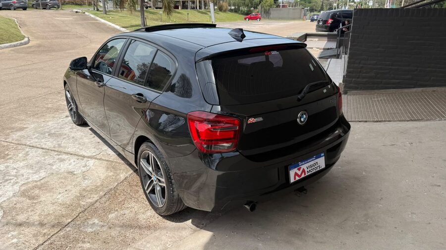BMW  118I SPORT  5 P. AUT. Recibo vehículo de menor y mayor valor.