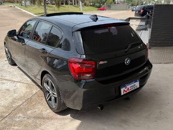 BMW  118I SPORT  5 P. AUT. Recibo vehículo de menor y mayor valor.