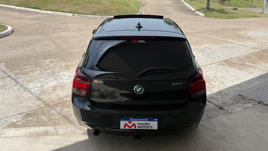 BMW  118I SPORT  5 P. AUT. Recibo vehículo de menor y mayor valor.