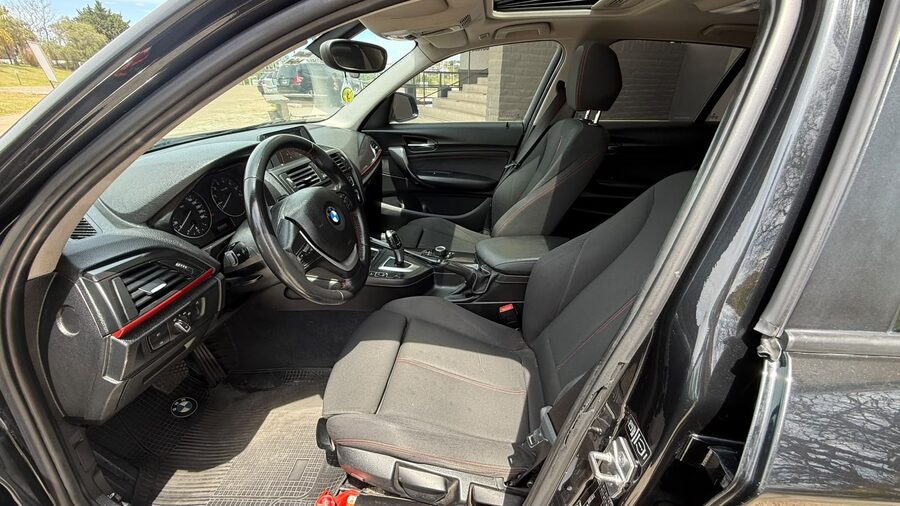 BMW  118I SPORT  5 P. AUT. Recibo vehículo de menor y mayor valor.